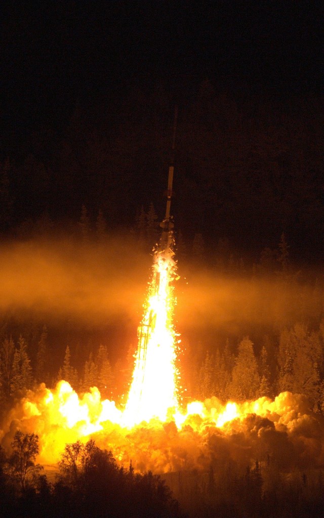 A NASA Oriole IV sounding rocket lifting off from its launch pad at Poker Flat Research Range in Alaska